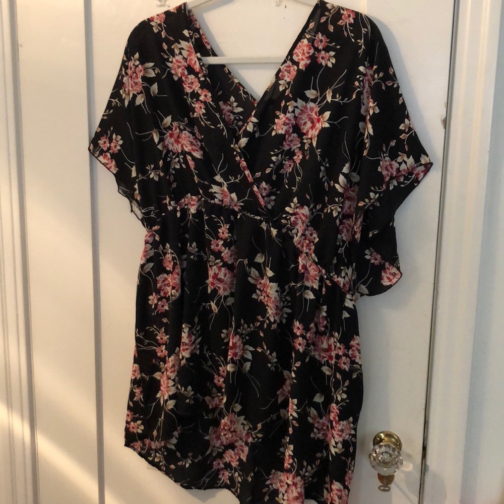 Cascading crossbody floral blouse